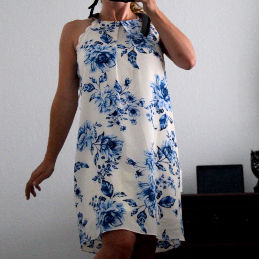 White dress with blue floral print